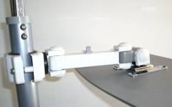 universal LCD monitor pole arm that can be aimed at the floor